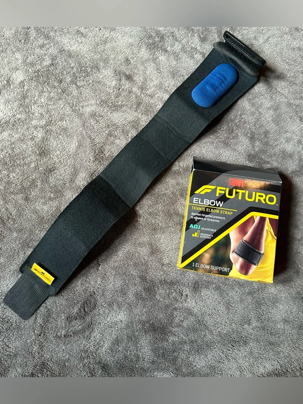 Futuro Black Elbow Support Strap with Blue Pad